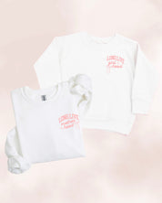 Adult and child sweater in white with "long live" design on front chest, shown on flat lay - Little Mama Shirt Shop