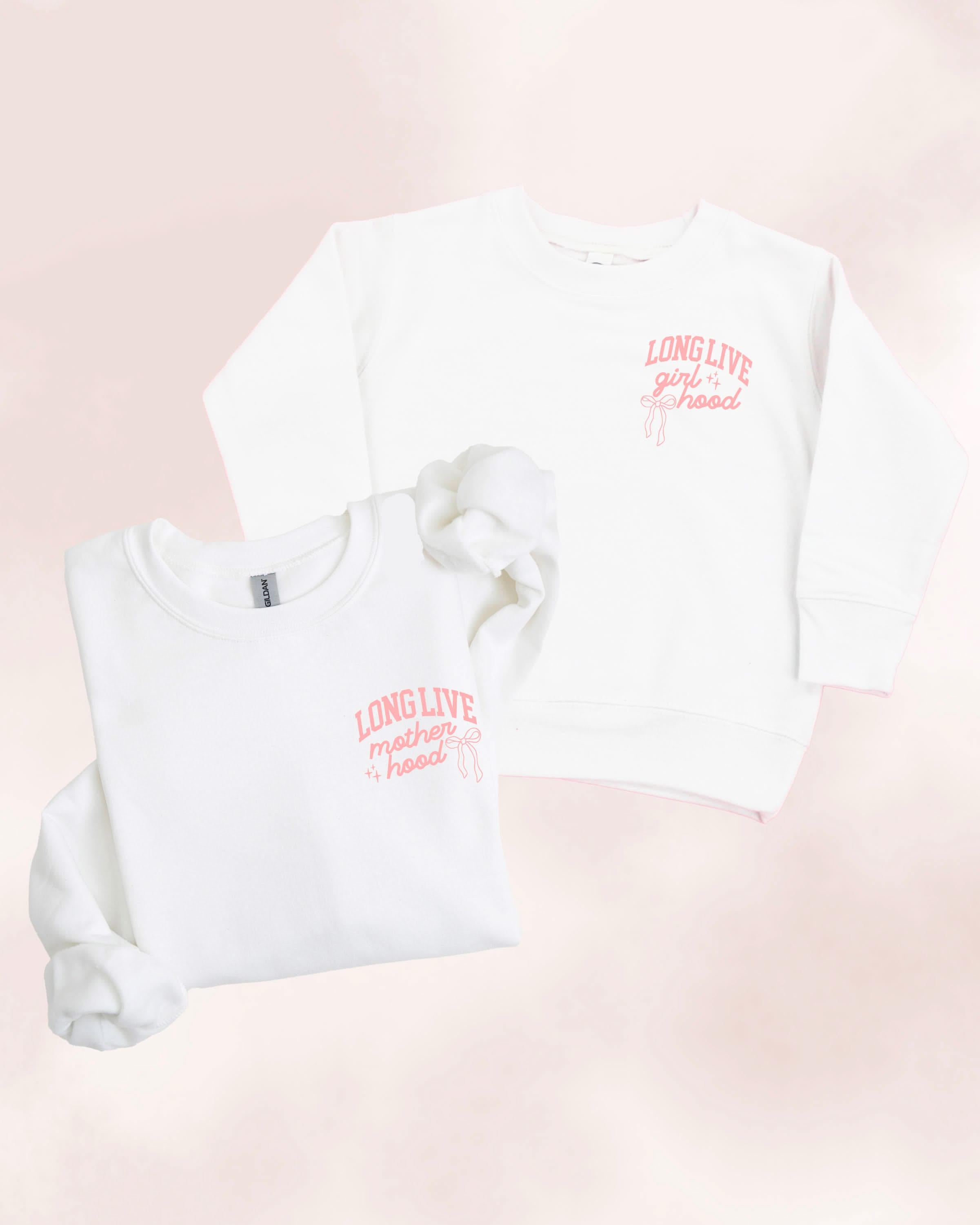 Adult and child sweater in white with "long live" design on front chest, shown on flat lay - Little Mama Shirt Shop