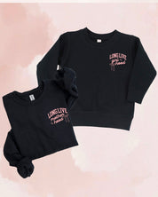Adult and child sweater in black with "long live" design on front chest, shown on flat lay - Little Mama Shirt Shop