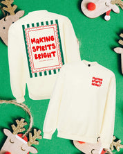 adult off-white basic fleece with 'making spirits bright' graphic, shown on flat lay – Little Mama Shirt Shop