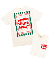 Adult ivory tee with 'making spirits bright' graphic, shown on flat lay – Little Mama Shirt Shop