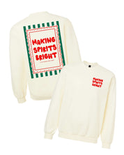 Adult off white sweater with 'making spirits bright' graphic, shown on flat lay – Little Mama Shirt Shop