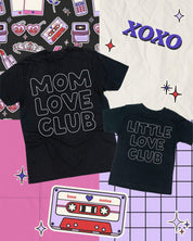 Adult and Child tee in black with "Little Love Club" and "Mom Love Club" bubble letter text design on back, shown on flat lay – Little Mama Shirt Shop
