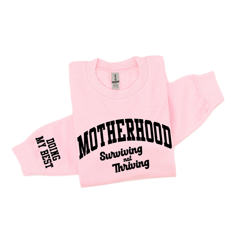 MOTHERHOOD - SURVIVING NOT THRIVING - DOING MY BEST - (Our 2024 Mantra) - Colors - LMSS® EXCLUSIVE - BASIC FLEECE CREWNECK