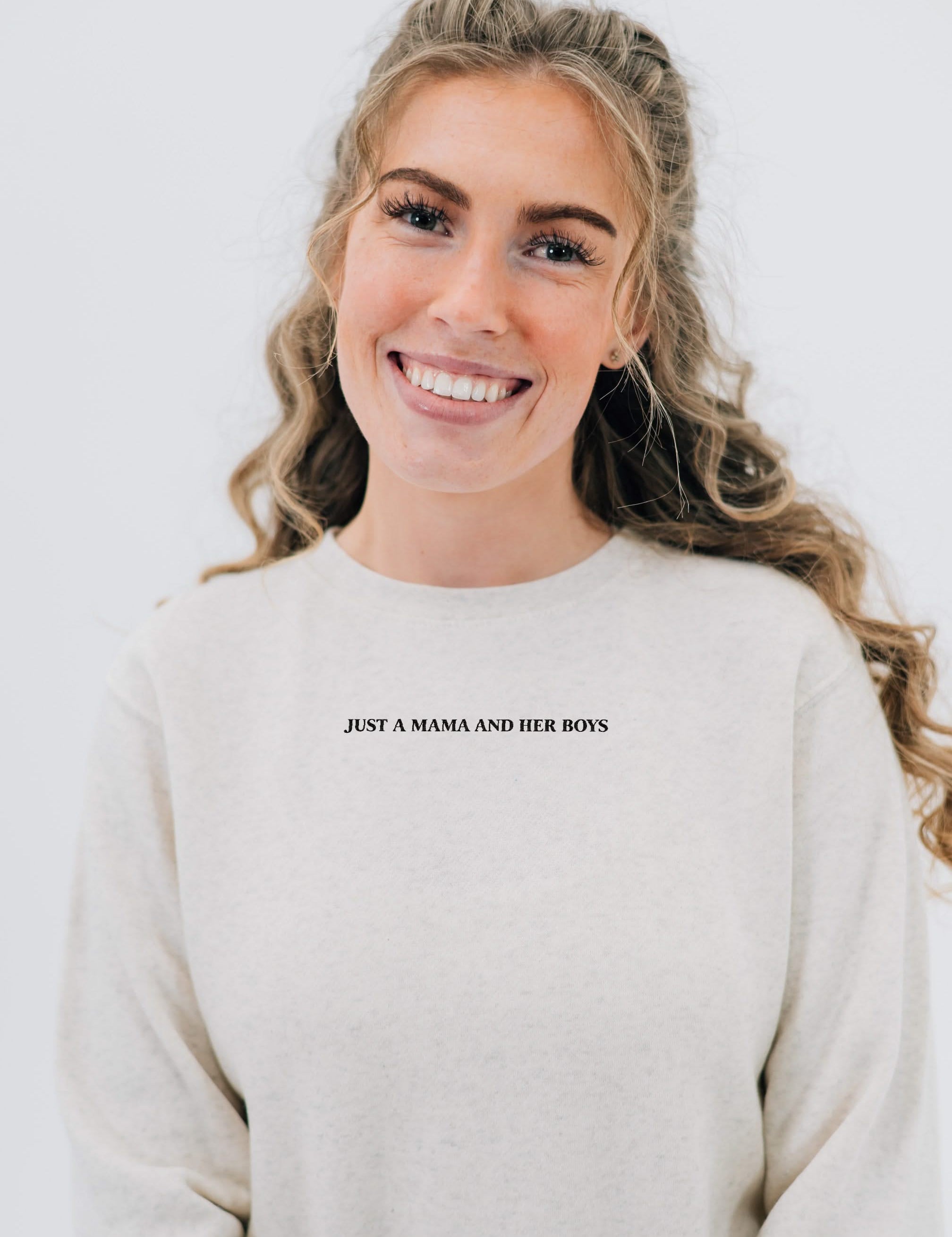 Adult sweater in natural with "Just a Mama and Her ___" design on the front, seen on model - Little Mama Shirt Shop