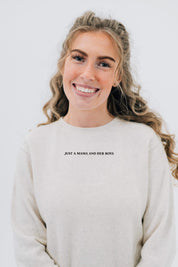 Adult sweater in natural with "Just a Mama and Her ___" design on the front, seen on model - Little Mama Shirt Shop
