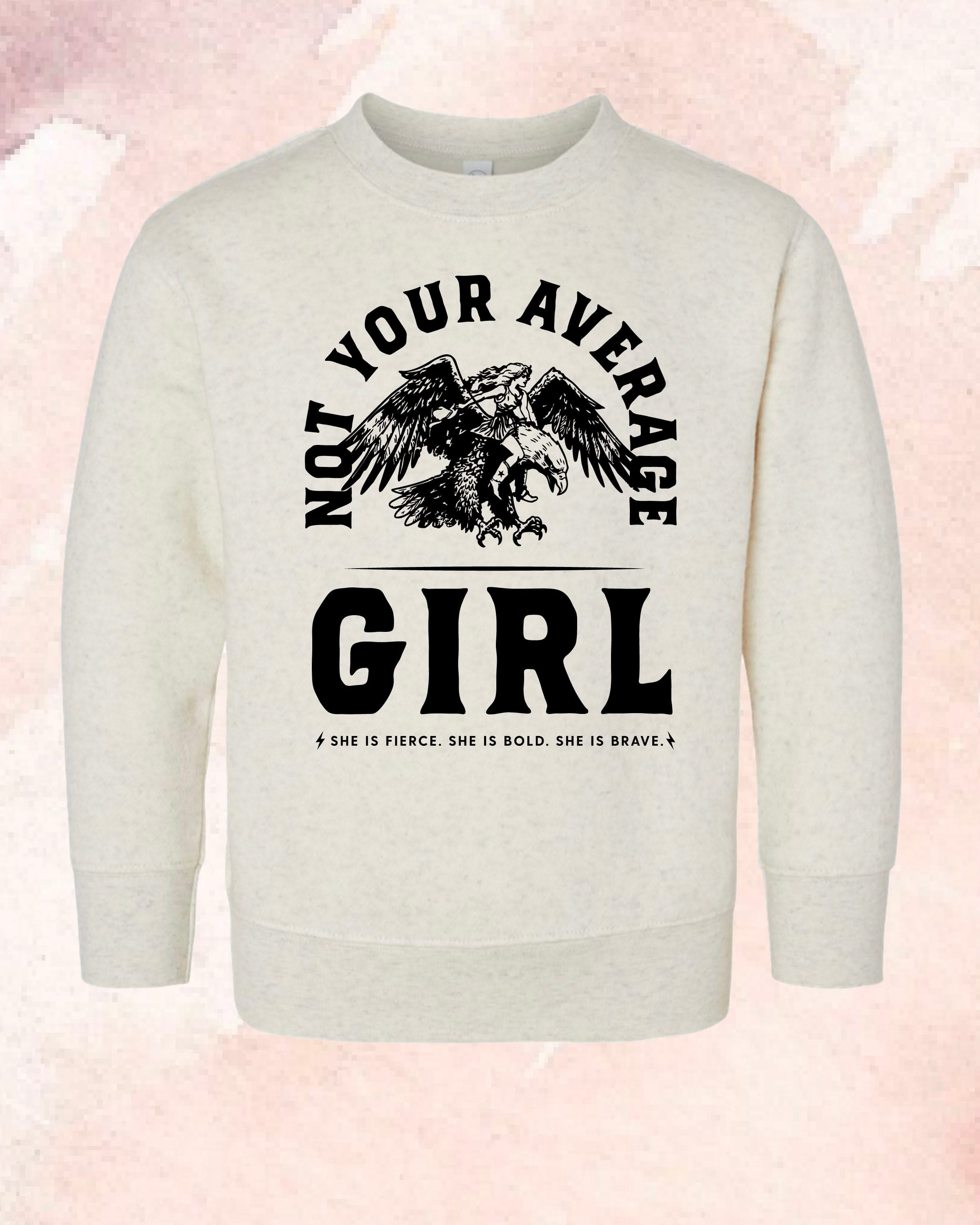 Child sweater in natural with "Not Your Average" design on front, shown on flat lay – Little Mama Shirt Shop