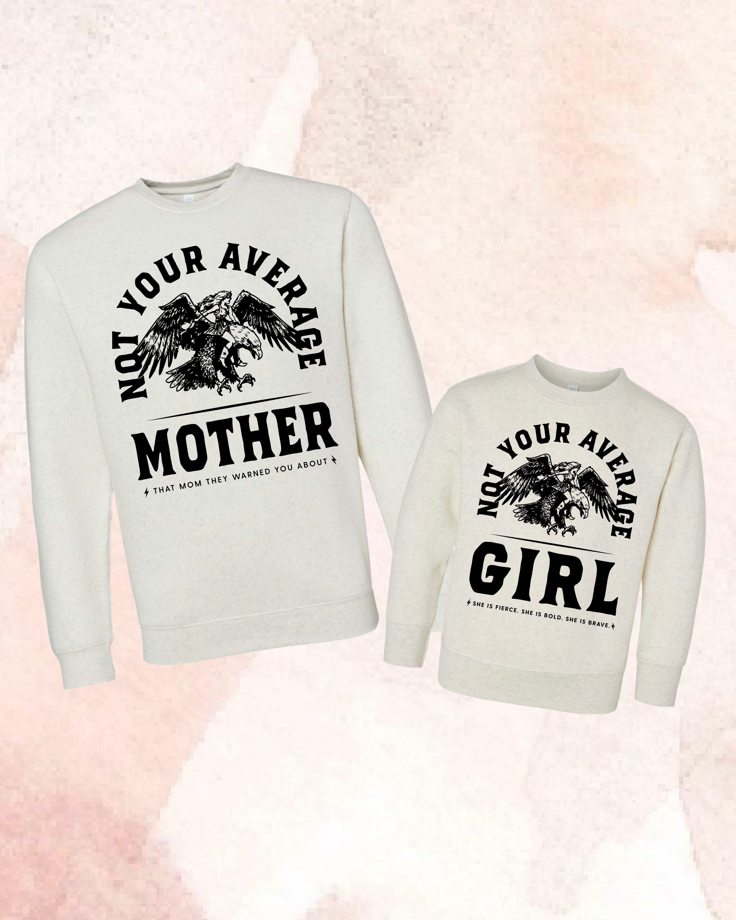 Adult and child sweaters in natural with "Not Your Average" design on front, shown on flat lay – Little Mama Shirt Shop