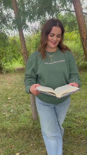 Video of embroidered “Will Yap About Books” pigment-dyed crewneck in pigment alpine with pink thread on model  – Little Mama Shirt Shop