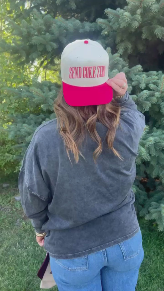 Video of red and cream trucker hat with bold red 'SEND COKE ZERO' text, seen on model - Little Mama Shirt Shop
