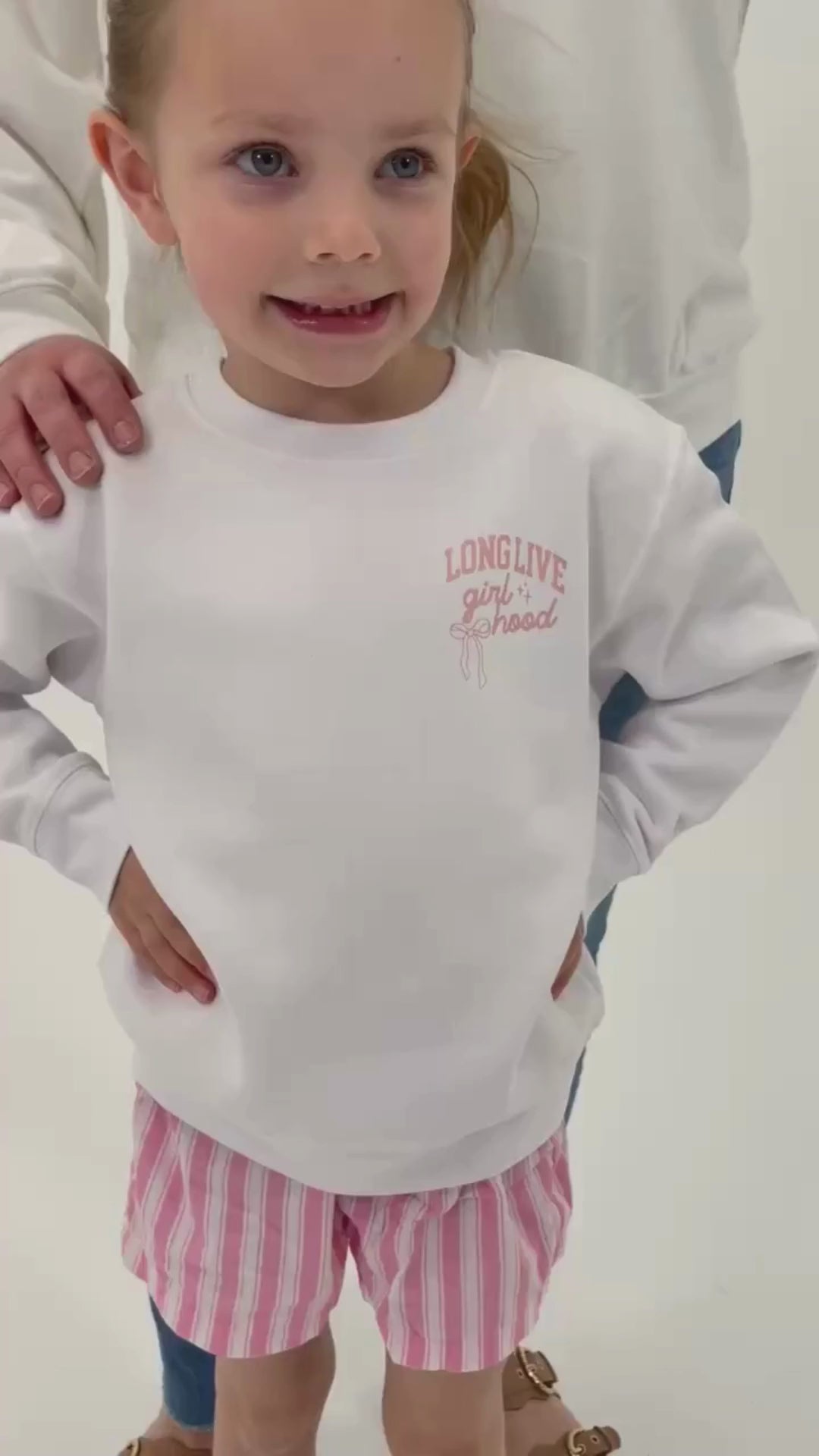 Video of adult and child sweater in white with "long live" design on front chest, shown on models - Little Mama Shirt Shop