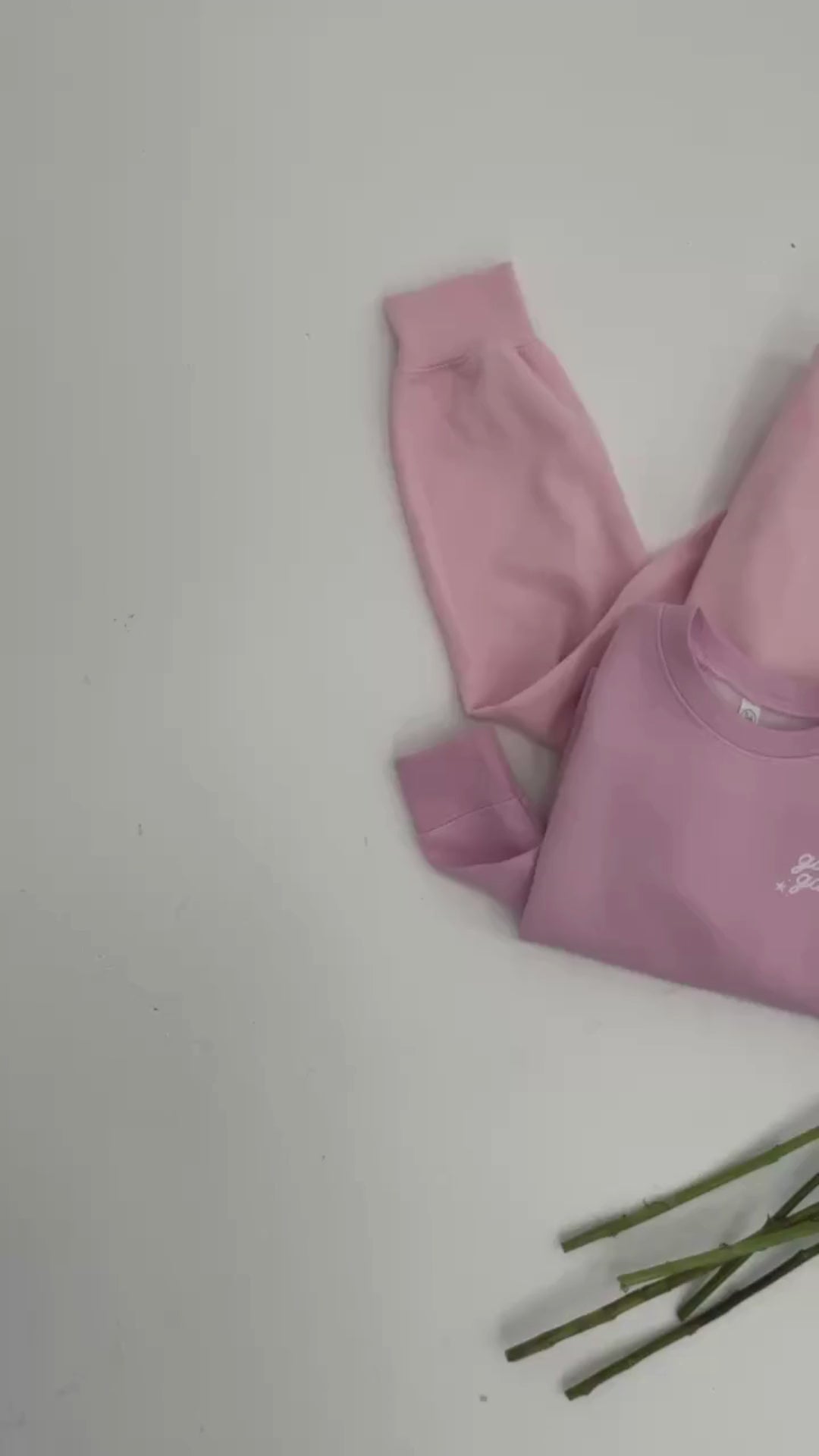 Video of adult and child sweaters in light pink with "girl gang" design on front chest, shown on flat lay - Little Mama Shirt Shop