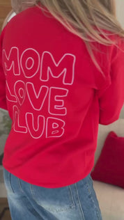 Video of Adult and Child sweater in red with "Little Love Club" and "Mom Love Club" bubble letter text design on back and front left chest small, shown on model – Little Mama Shirt Shop