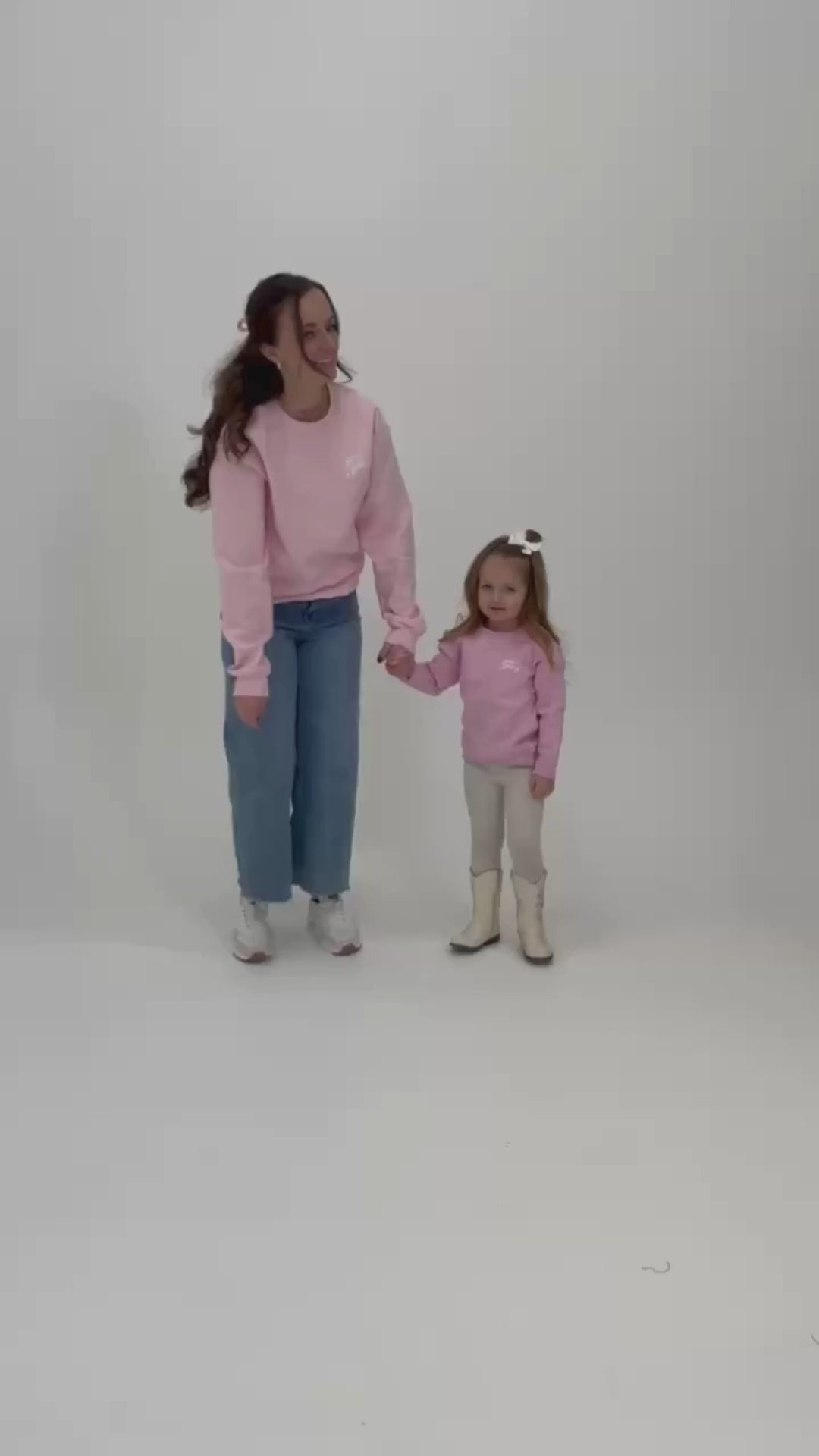 Video of Adult and child sweater in light pink with "girl gang" design on front chest, shown on models - Little Mama Shirt Shop