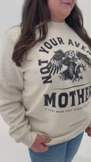 Video of adult and child sweaters in natural with "Not Your Average" design on front, shown on models  – Little Mama Shirt Shop