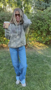 Video of hoodie in camo with puff print 'mother' on chest, shown on model – Little Mama Shirt Shop