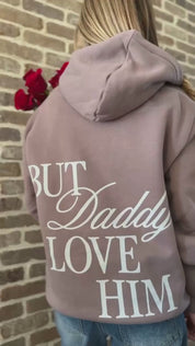 Video of Adult hoodie in brown with "But Daddy I Love Him" design on back and "loml" script on hood, shown on model – Little Mama Shirt Shop