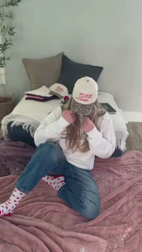 Video of Adult sweater with "Darling" script and lipstick kiss design, shown on model  – Little Mama Shirt Shop