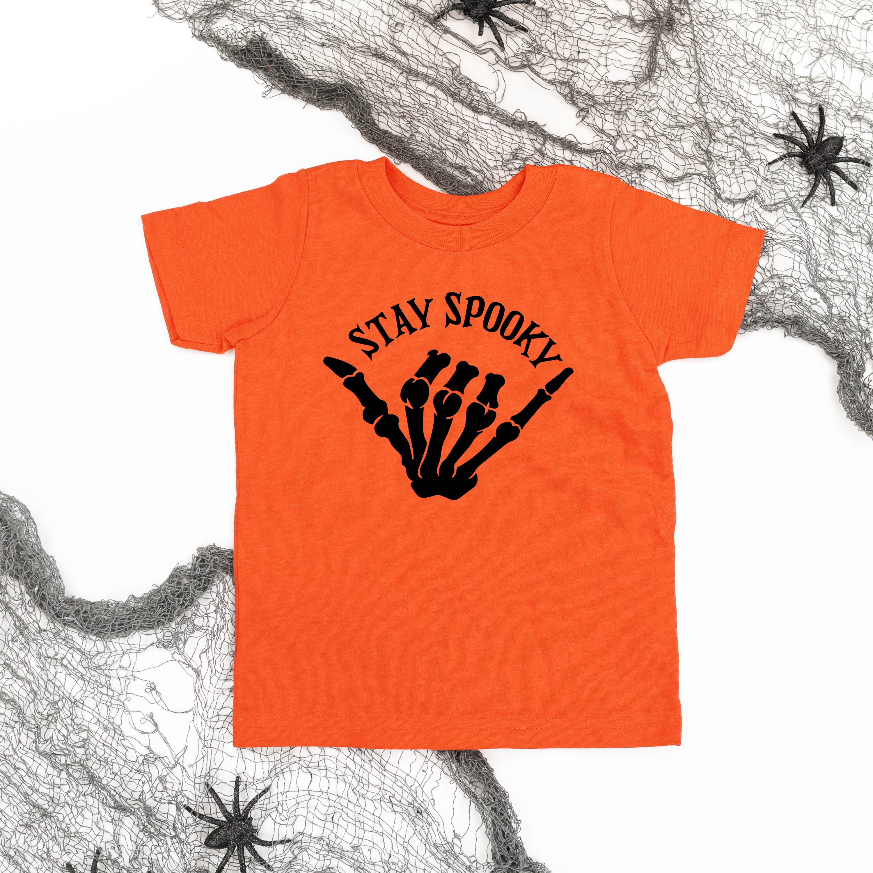 short_sleeve_kids_tees_stay_spooky_skeleton_hand_little_mama_shirt_shop