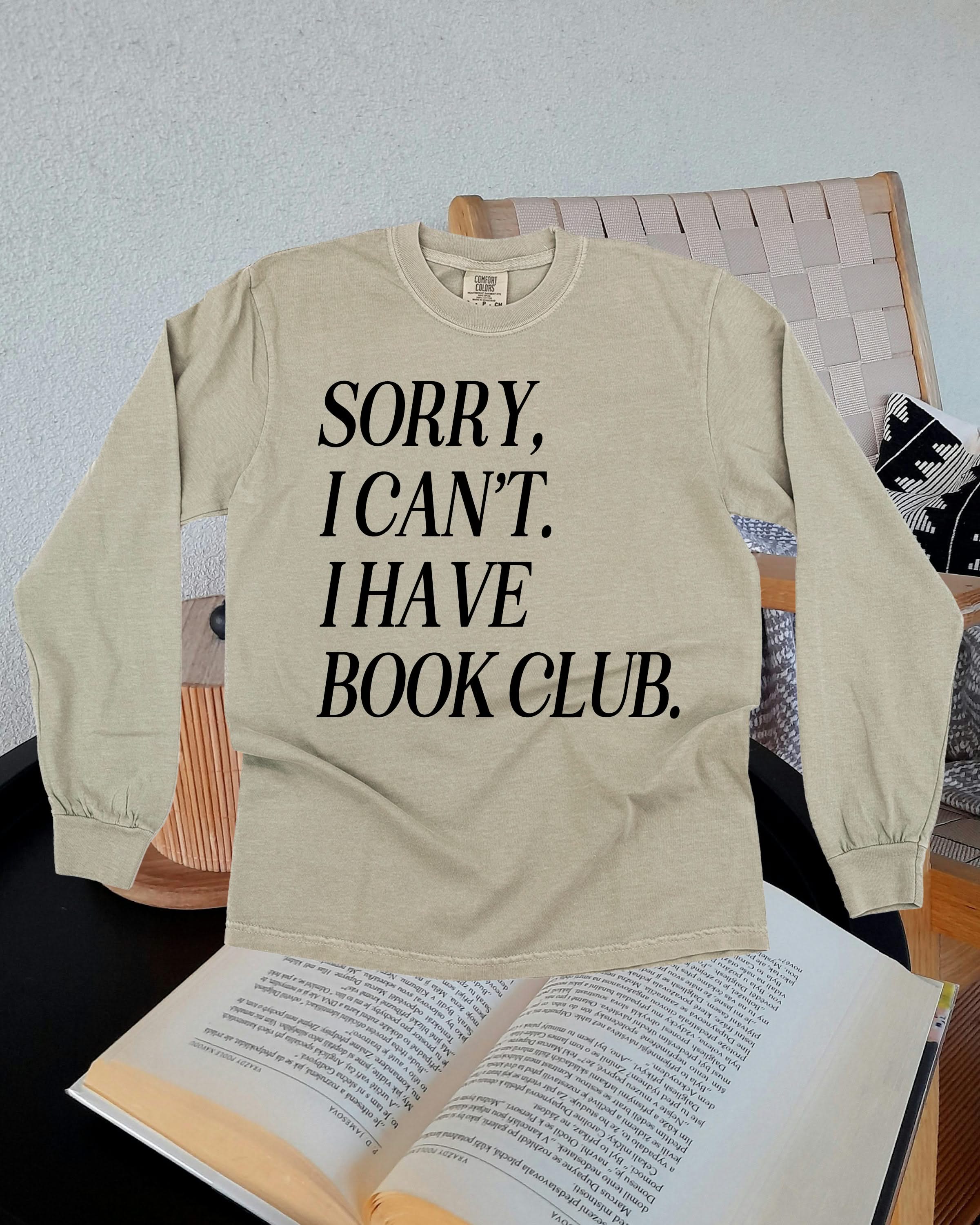 Unisex Long Sleeve Comfort Colors tee “Sorry, I Can't. I Have Book Club." in sandstone, flat lay – Little Mama Shirt Shop