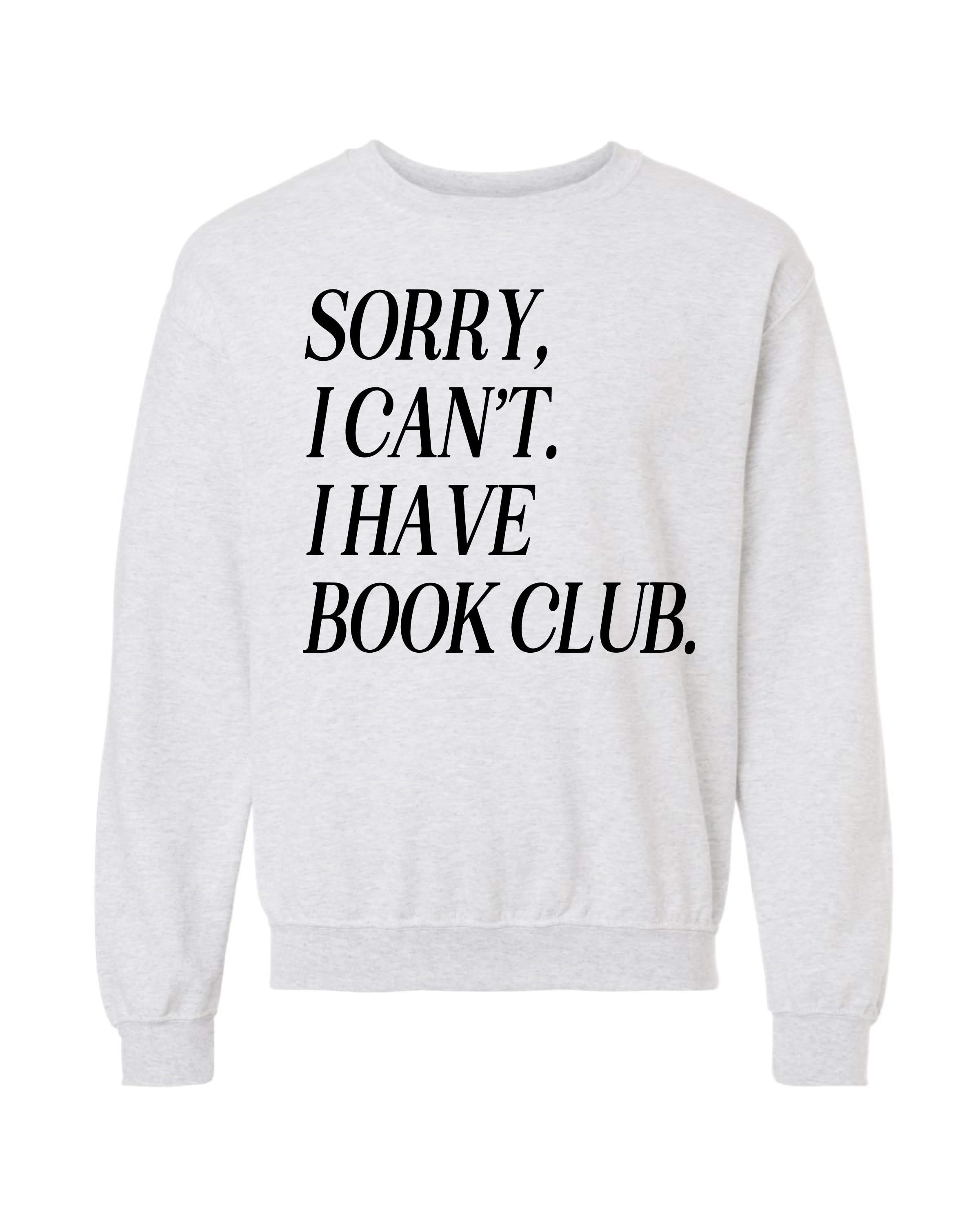 Unisex fleece sweatshirt in ash with “Sorry, I Can't. I Have Book Club.” design, on flat lay – Little Mama Shirt Shop