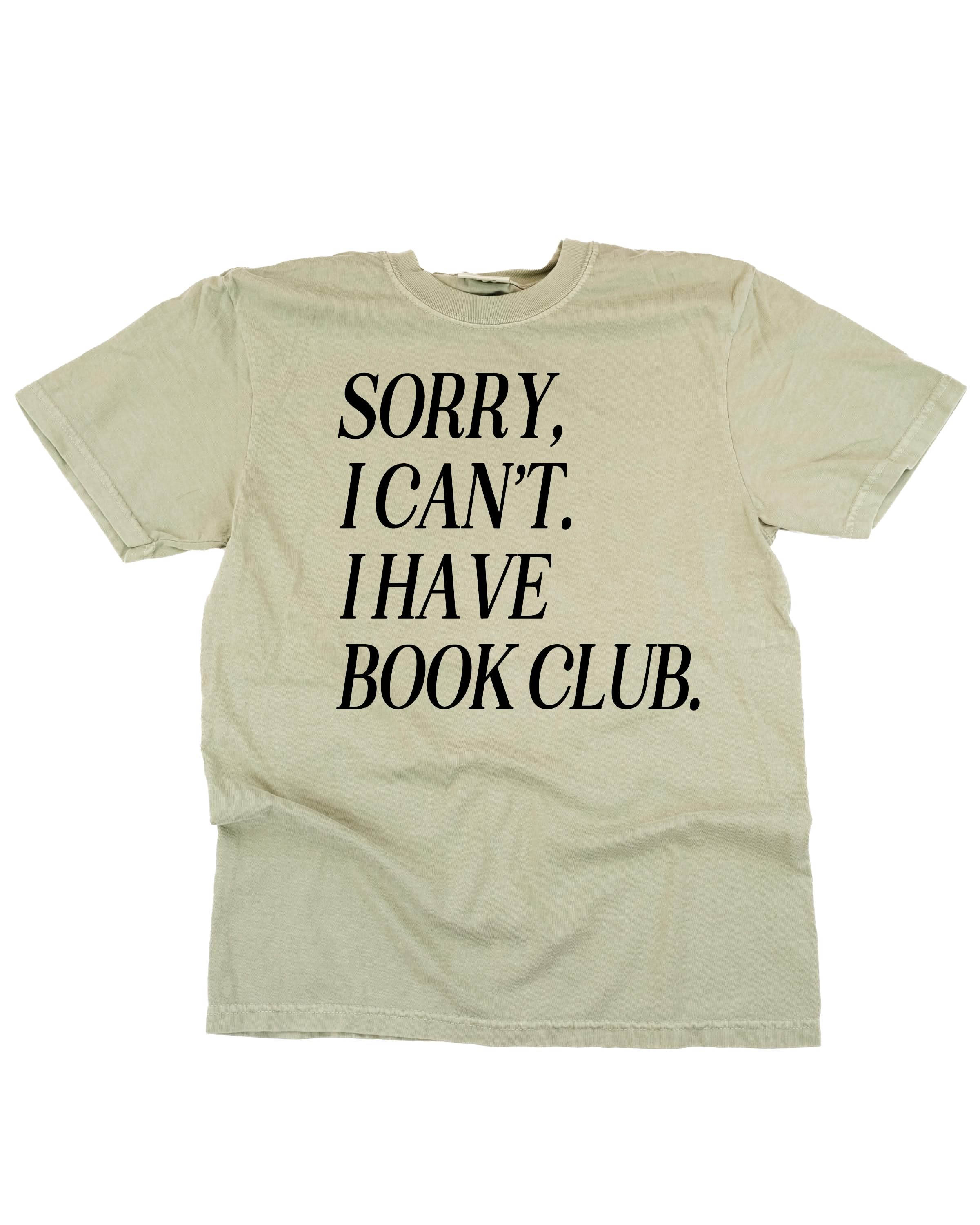 Unisex Comfort Colors “Sorry, I Can't. I Have Book Club." in sandstone, flat lay – Little Mama Shirt Shop