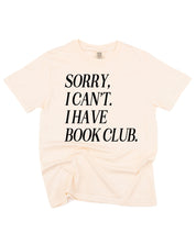 Unisex Comfort Colors “Sorry, I Can't. I Have Book Club." in ivory, flat lay – Little Mama Shirt Shop
