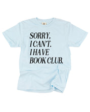 Unisex Comfort Colors “Sorry, I Can't. I Have Book Club." in chambray, flat lay – Little Mama Shirt Shop