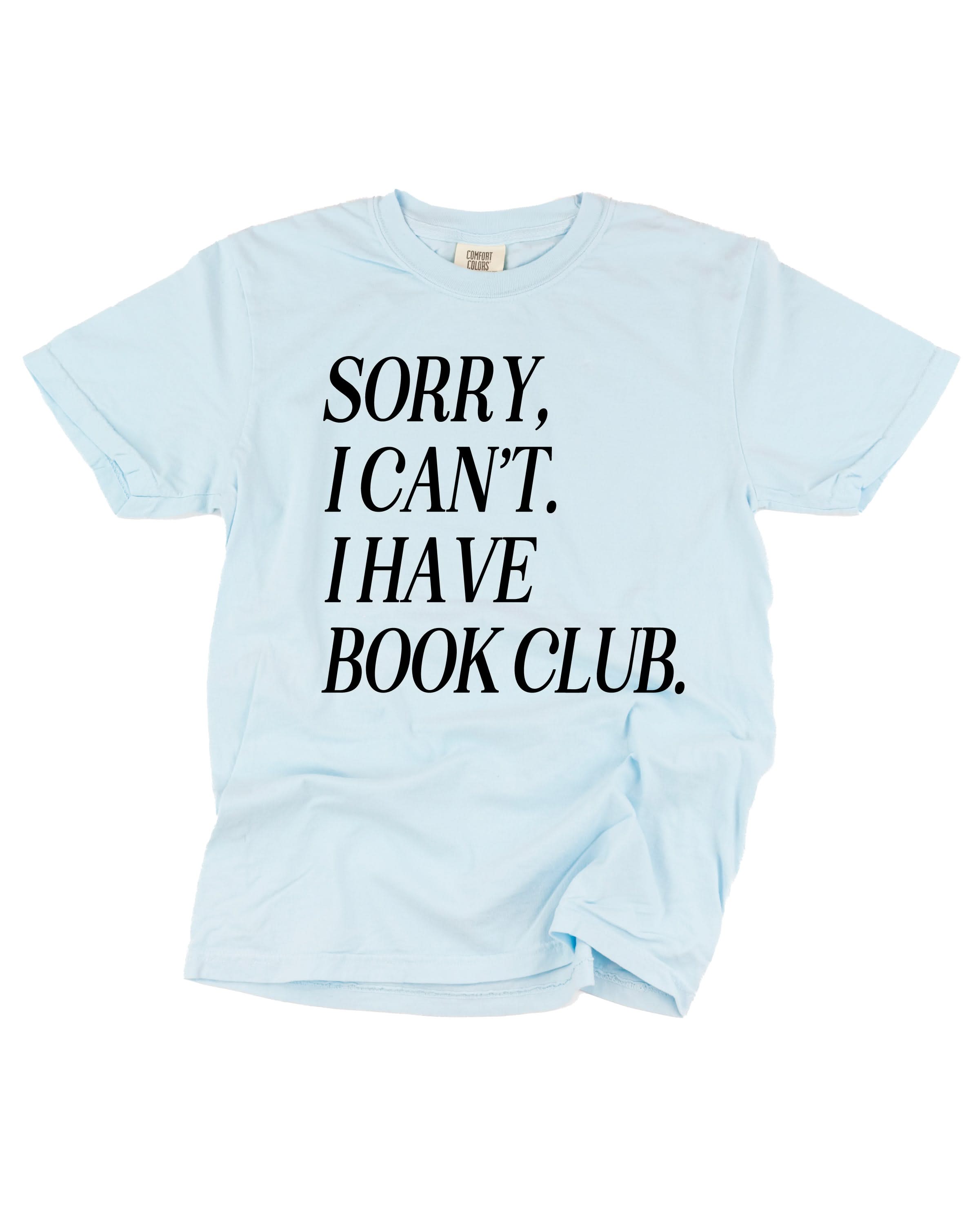 Unisex Comfort Colors “Sorry, I Can't. I Have Book Club." in chambray, flat lay – Little Mama Shirt Shop