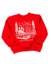 Child sweater in red with St. Nick's Christmas Tree Farm graphic on the front, shown on model – Little Mama Shirt Shop