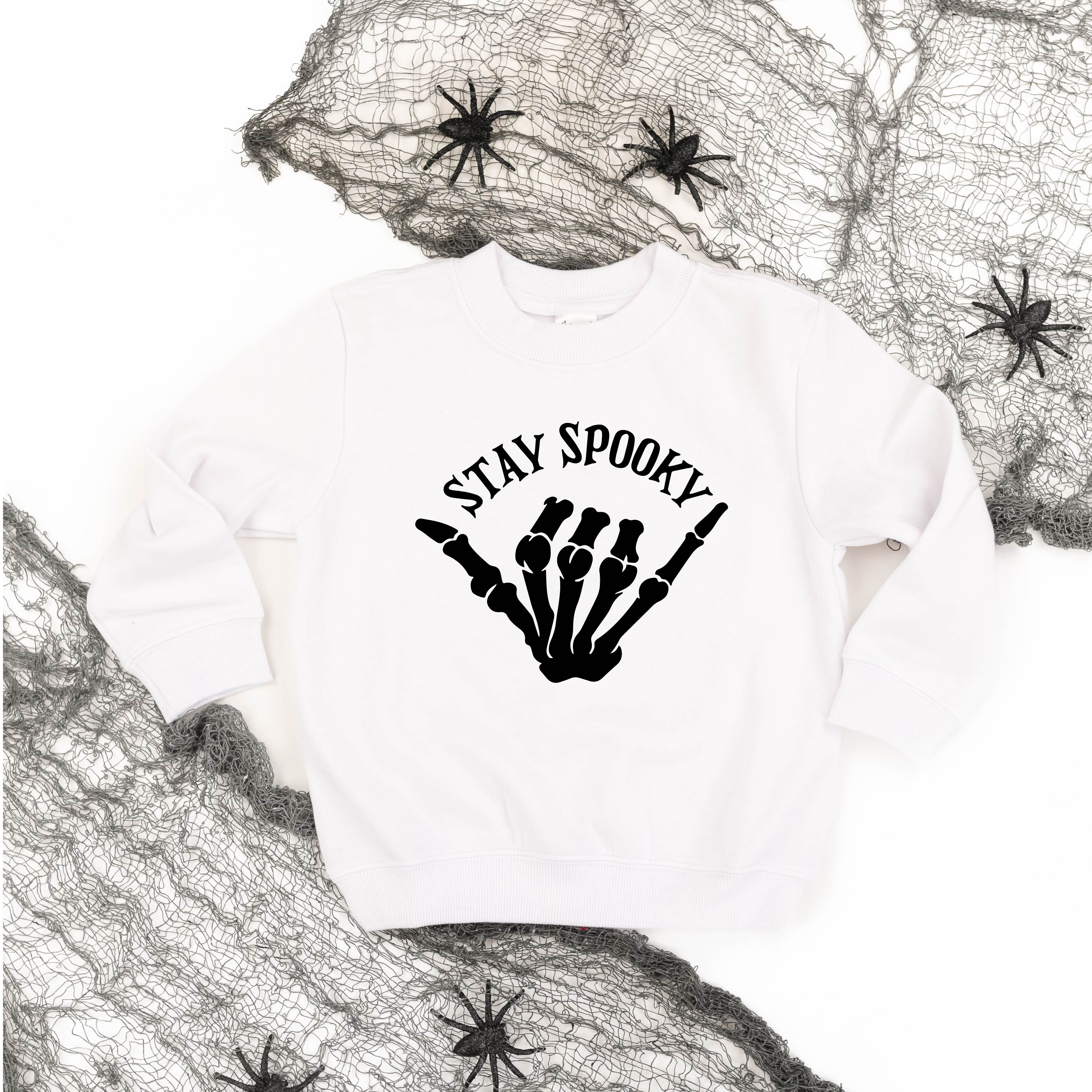 sweatshirts_child_stay_spooky_skeleton_hand_little_mama_shirt_shop