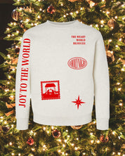 Child sweater in natural with Christian Christmas graphics on the front, shown on flat lay – Little Mama Shirt Shop