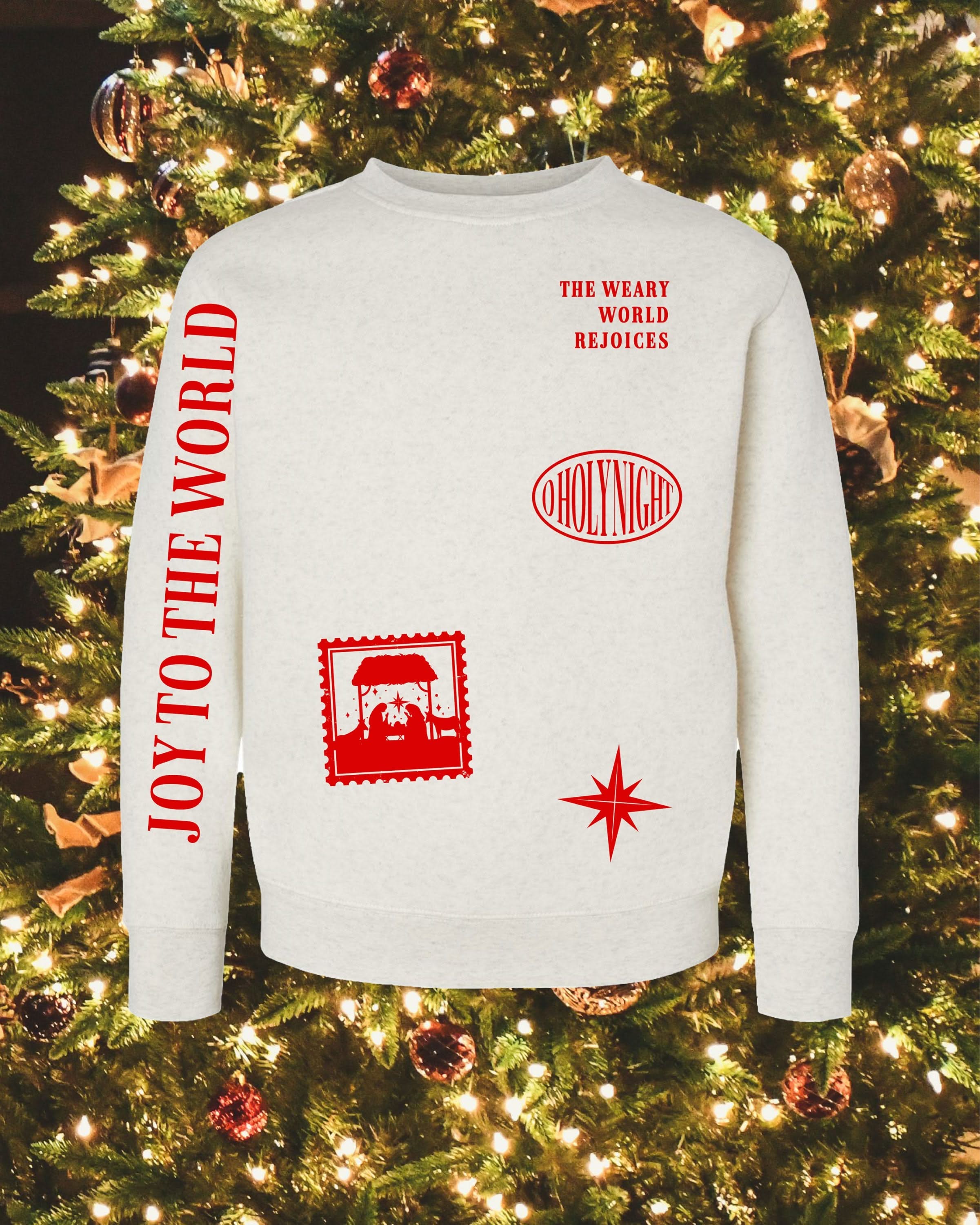 Child sweater in natural with Christian Christmas graphics on the front, shown on flat lay – Little Mama Shirt Shop