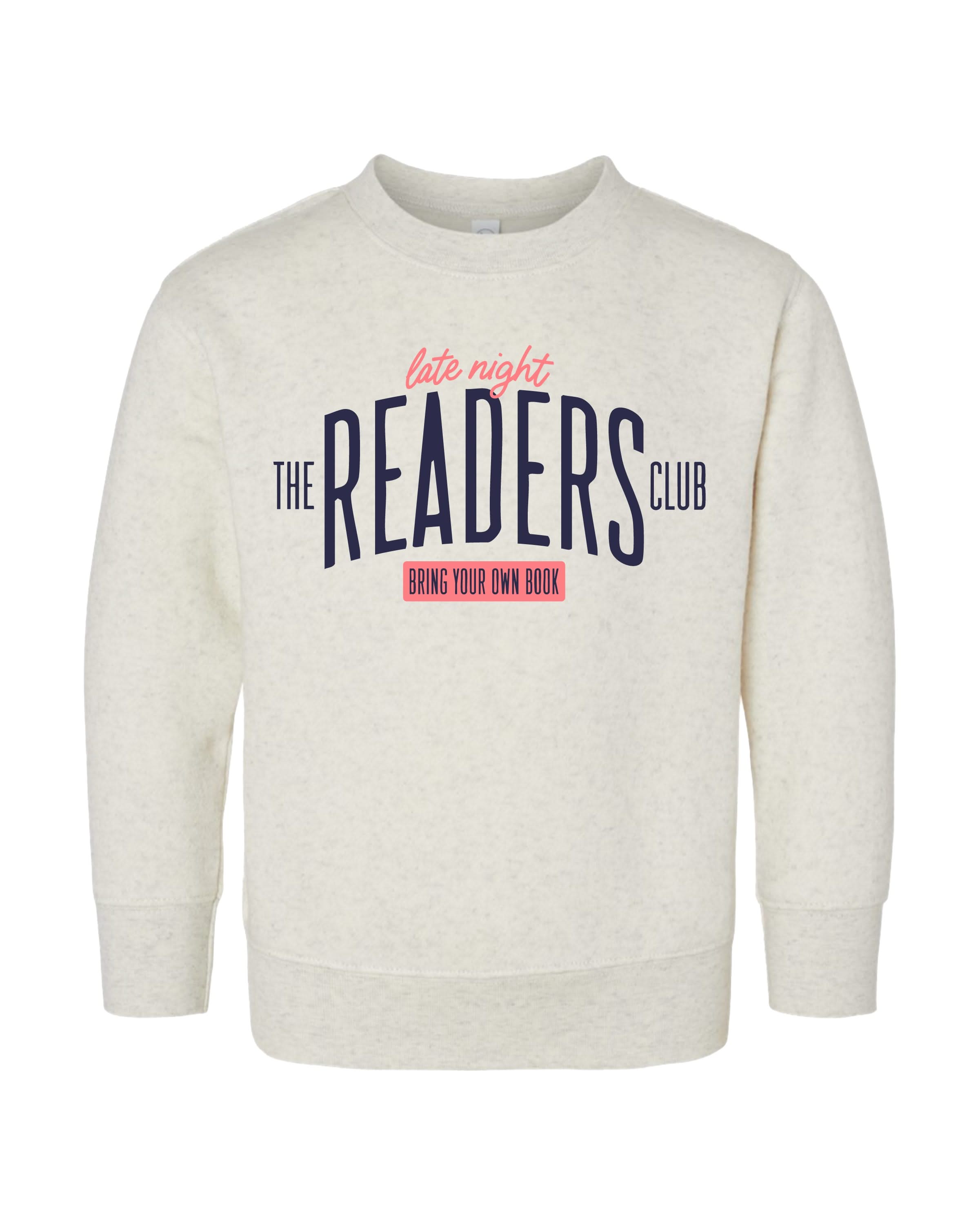 Kids fleece sweaters with “Late Night Readers Club BYOB” design on flat lay – Little Mama Shirt Shop