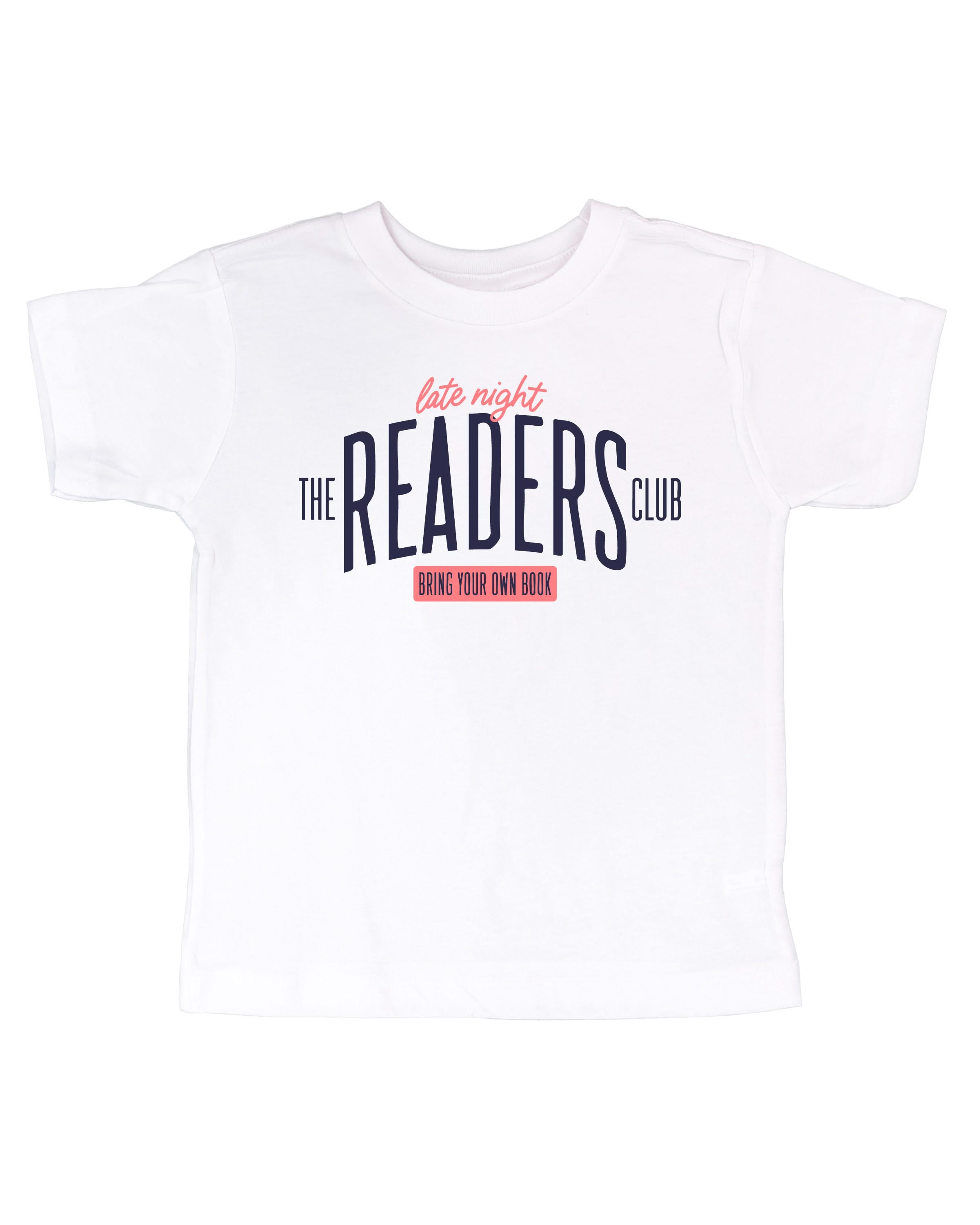 Child’s t-shirt with “Late Night Readers Club BYOB” design in white, on flat lay – Little Mama Shirt Shop
