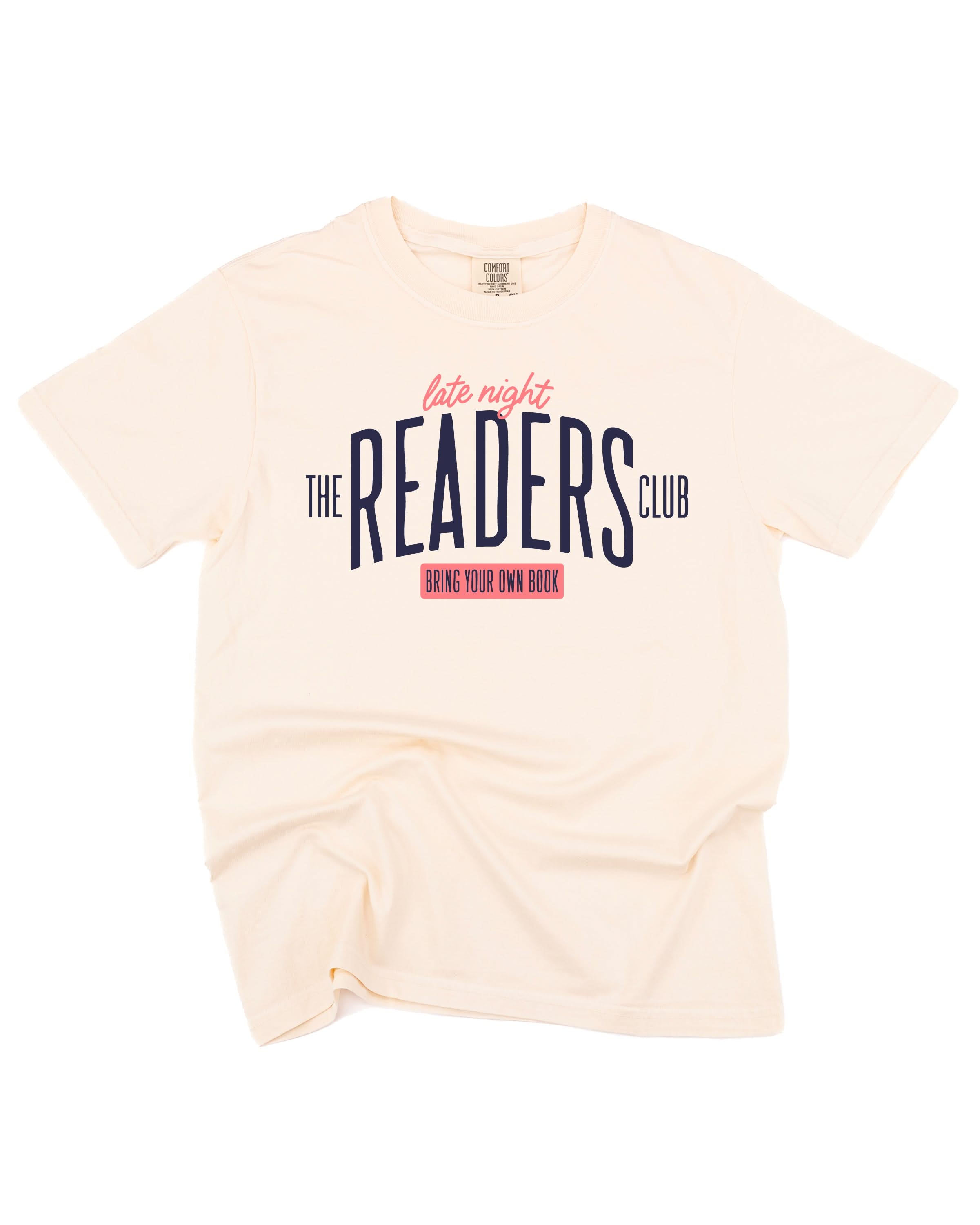 Unisex Comfort Colors tee with “Late Night Readers Club BYOB” design in ivory, flat lay – Little Mama Shirt Shop
