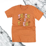 Trick or Treat (PINK/ORANGE) - Unisex Tee Little Mama Shirt Shop