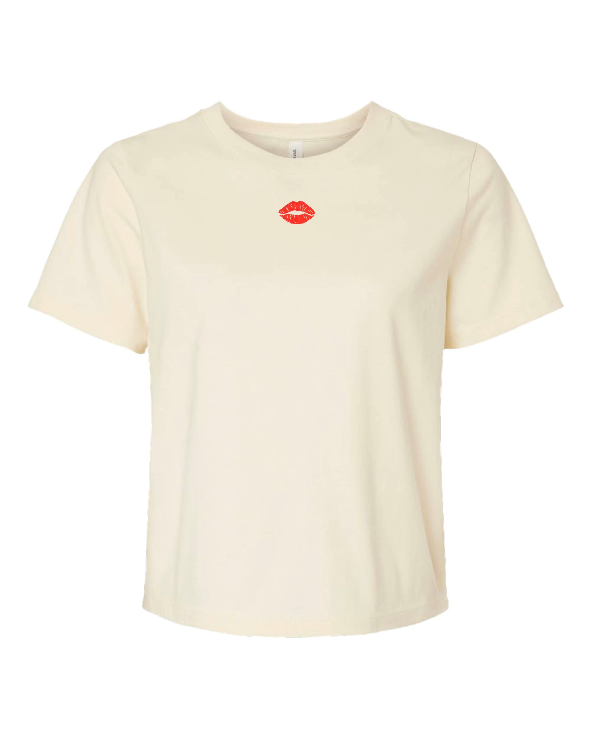 Adult tee in natural with mini symbol lips design on front, shown on flat lay – Little Mama Shirt Shop
