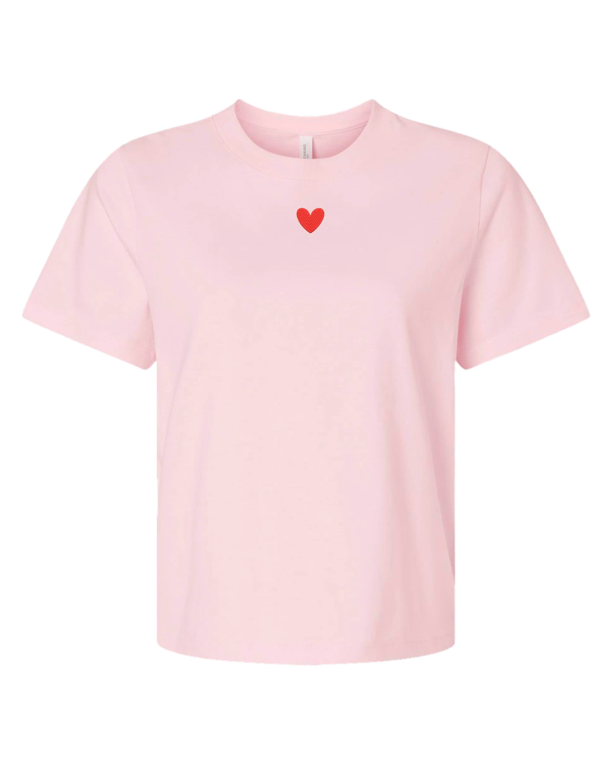 Adult tee in soft pink with mini symbol heart design on front, shown on flat lay – Little Mama Shirt Shop