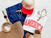 White AMERICA gingham shirt styled with denim shorts and summer accessories for a relaxed holiday outfit