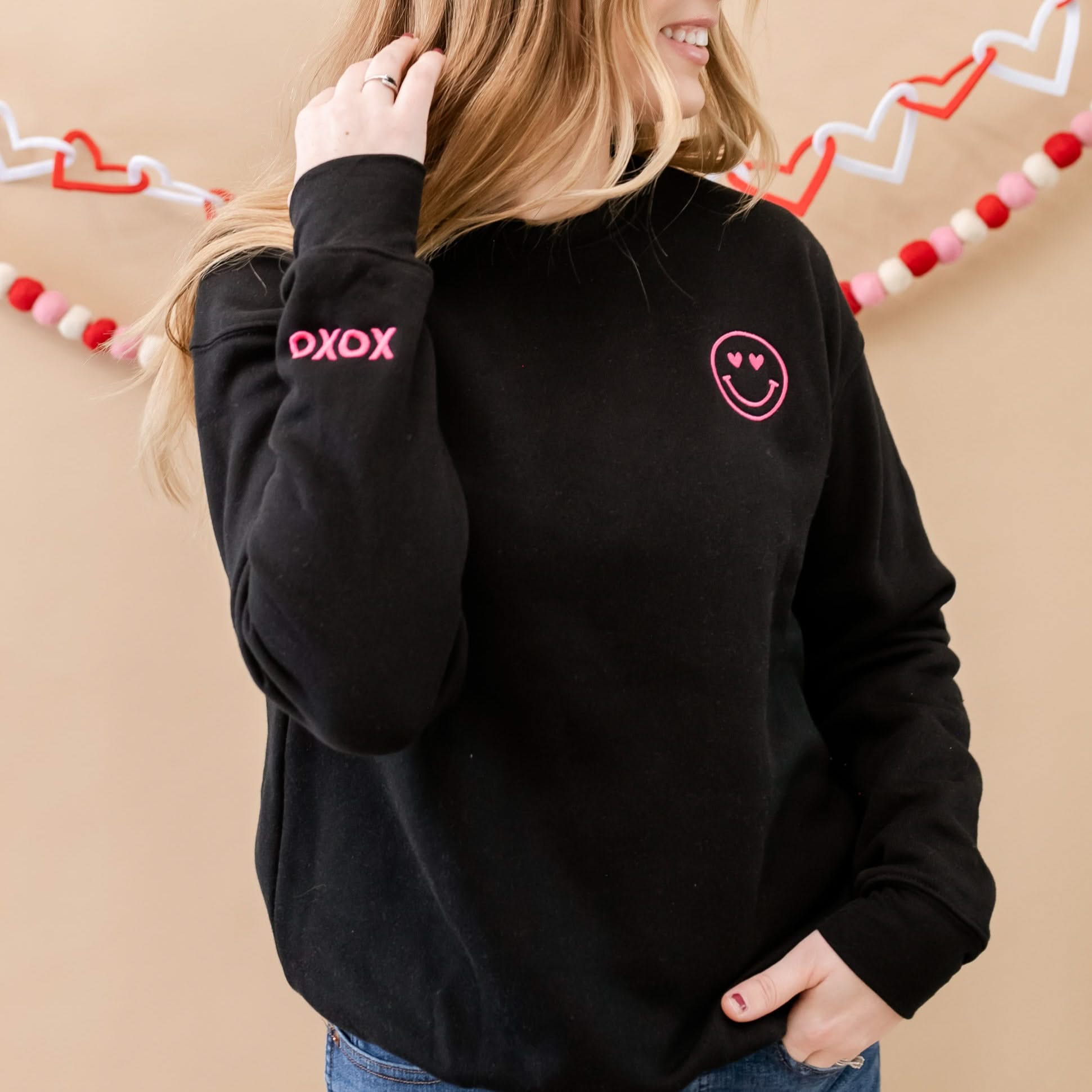 Embroidered SUPER-SOFT Fleece - Black w/ Hot Pink - Heart Eye Smiley + XOXO wrist detail Little Mama Shirt Shop